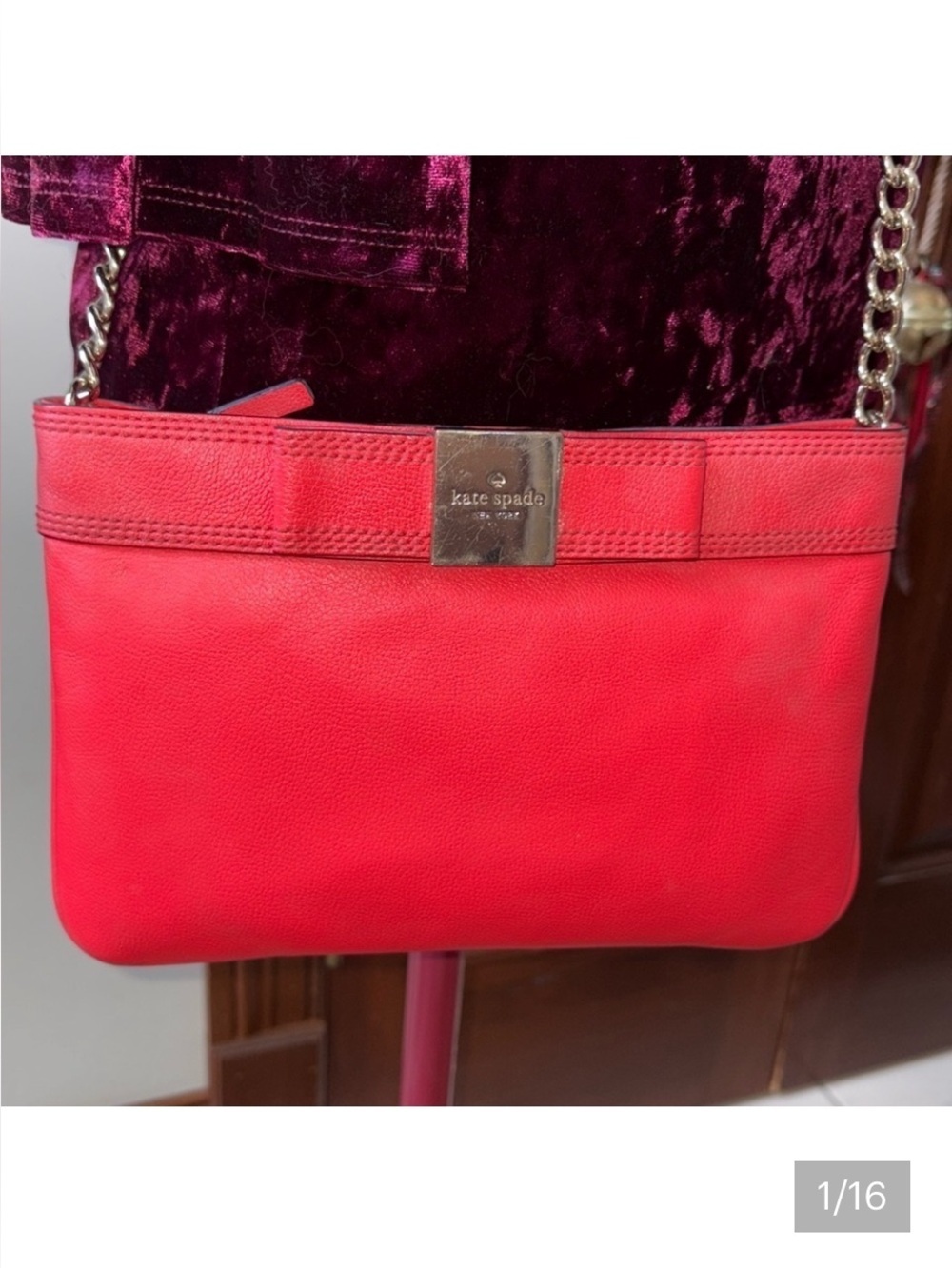 Kate Spade   Crossbody bag  leather orangeish red   bow on front chain strap det